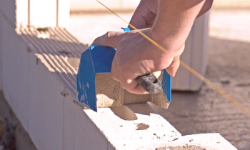 Cómo elegir un pegamento para bloques de concreto aireado: puntas, fortaleza, flujo