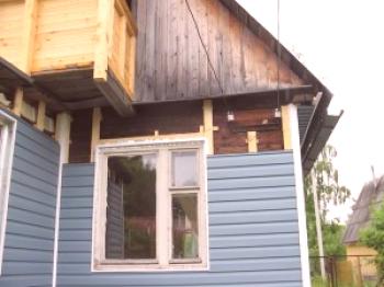 Revestimiento de una casa de madera con revestimiento térmico con sus propias manos: instrucciones en video y foto