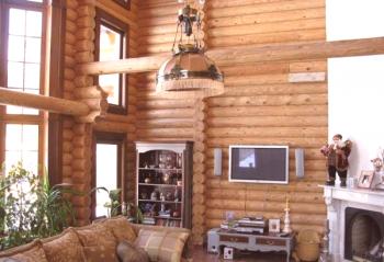 Diseño de una casa de madera dentro de la foto y video.