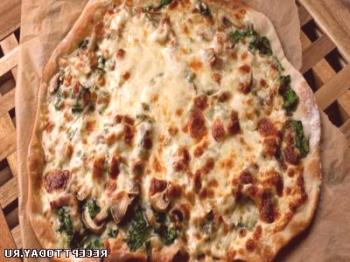Receta: Pizza con espinacas y champiñones.